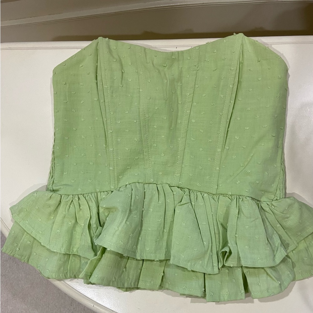 Peplum style top